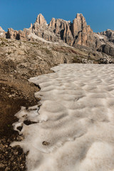 melting snowfield in Dolomites
