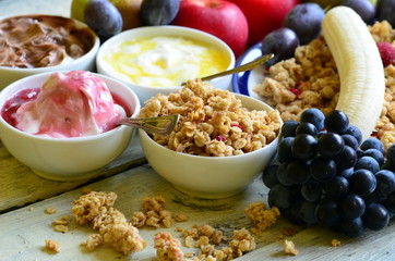 Fruit muesli with yogurt and cereals for breakfast