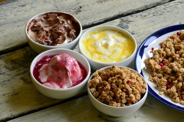 Fruit muesli with yogurt and cereals for breakfast