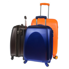 Luggage consisting of three polycarbonate suitcases isolated on white
