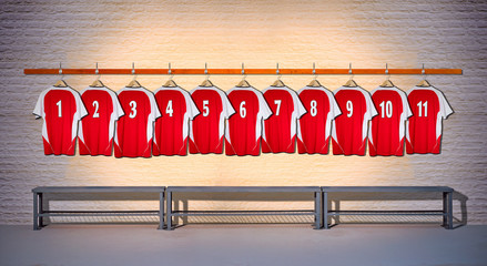 Row of Red Football Shirts hanging on Wall in Changing Room with Bench