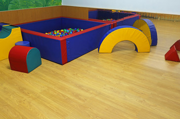 gym for children with many exercise equipments to perform the ex