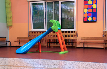 plastic slide for kids in the kindergarten