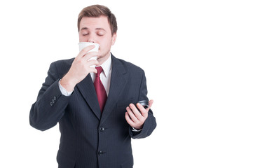 Businessman enjoying a coffee break with fresh smell