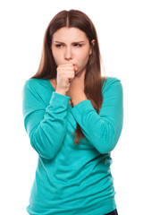 portrait of an young woman coughing with fist