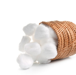 Cotton swabs in basket isolated on white background