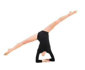 little gymnast doing exercise with skipping rope