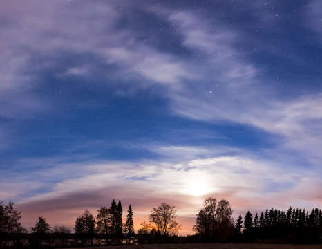 Night landscape and cloudy starry sky panorama