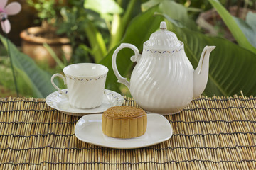 Moon cake with durian and macadamia nut filling