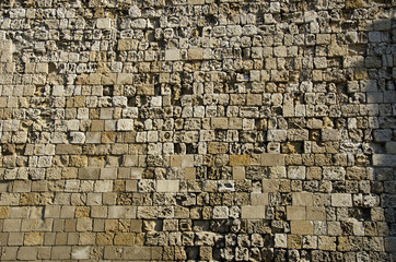 Antique wall made of stones in Greece