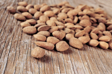 shelled almonds on a wooden table