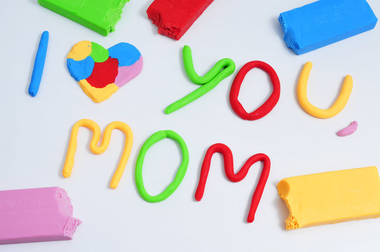text I love you mom, made in modeling clay