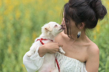 asian young woman with her dog