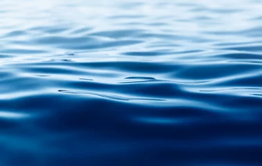 Afwasbaar Fotobehang Oceaan golf blue water background with ripples