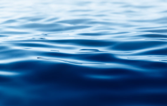 Fototapeta blue water background with ripples