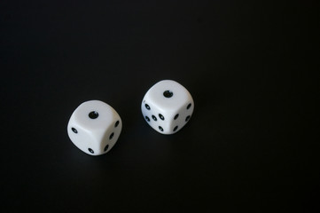 Two dice with snake eyes