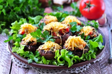 mushrooms stuffed with vegetables and bacon, baked with cheese