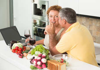 Fototapeta premium Mature couple in the kitchen