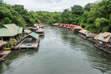 Obraz premium floating house in river Kwai. Taken at Sai Yok Yai waterfall. Kanchanaburi of Thailand.