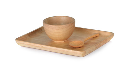 Cups and wooden spoons on white background
