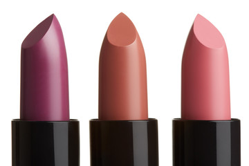 Obraz premium Lipstick group in purple, brown, pink colors on white, clipping path