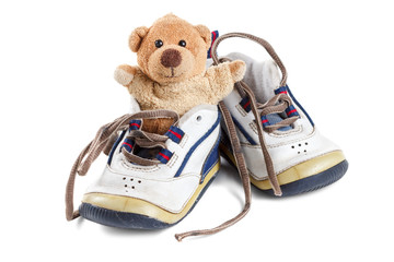 Lovely old Baby's shoes with a teddy bear