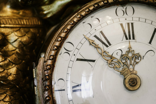 Antique Clock With Roman Numerals