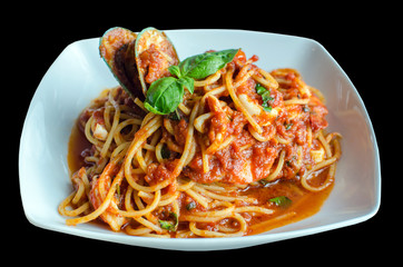 spaghetti sea food on white plate