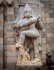 Fototapeta na wymiar Hindu goddess statue carved in temple wall