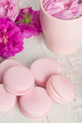 Pastel pink macaroons with rose