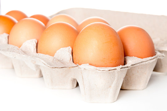 Eggs in carton container closeup