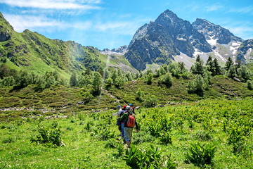 Fototapeta na wymiar Group hiking in the mountains on a tourist track