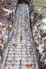 building foundations, reinforcement, concrete rubble, wooden for