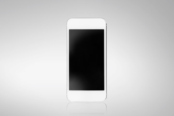 White smartphone on a gray background
