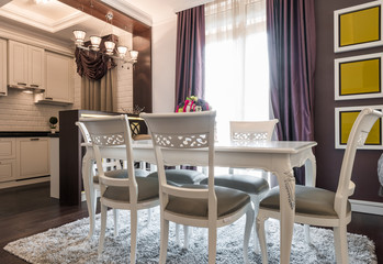 Dining room interior in modern bright apartment