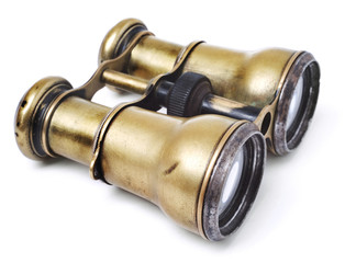 Old binoculars on white background
