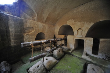 Inside the underground Olive Oil-press Cave in Beit Govrin, Israel