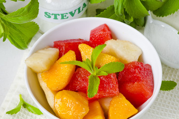 Fruit Salad and Stevia Powder. Natural Sweetener.