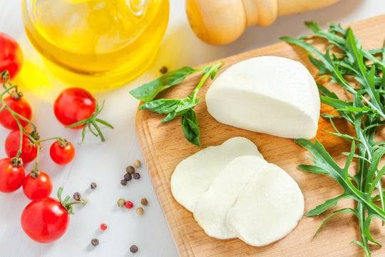 Cooking of salad with mozzarella and tomatoes, top view