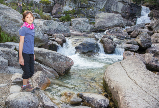 High Tatras - Studenovodske waterfalls and young girl