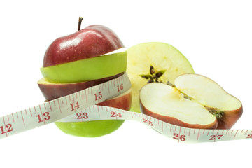 apple with measuring tape on white background 1