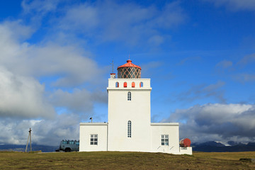 Fototapeta na wymiar Dyrholaey lighthouse, iceland. Built in 1927 on a high promontory at the southernmost point of Iceland
