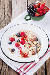  Granola, muesli , honey, yogurt and fresh berries .Healthy breakfast.selective focus