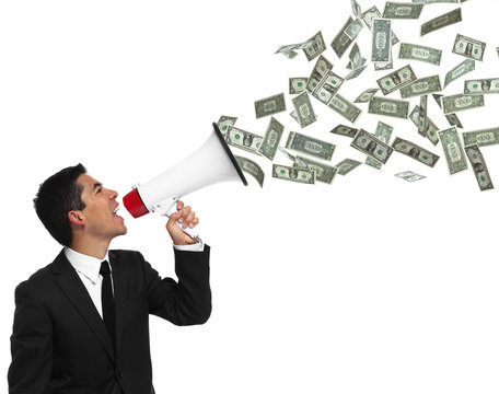 Businessman yelling into a megaphone with money coming out of it