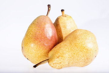 some fresh pears isolated on white background