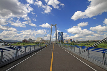KRASNOYARSK, RUSSIA - JULY 16, 2013:  Pedestrian bridge over the Yenisei to the Tatyshev Island