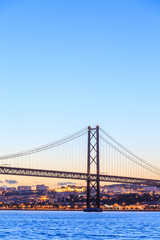 Fototapeta na wymiar Lisbon cityscape and the 25 de Abril Bridge