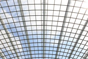 the metal and glass roof inside of office