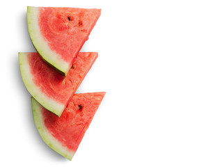Three slices of watermelon on each other