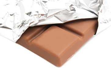 milk chocolate in a foil closeup